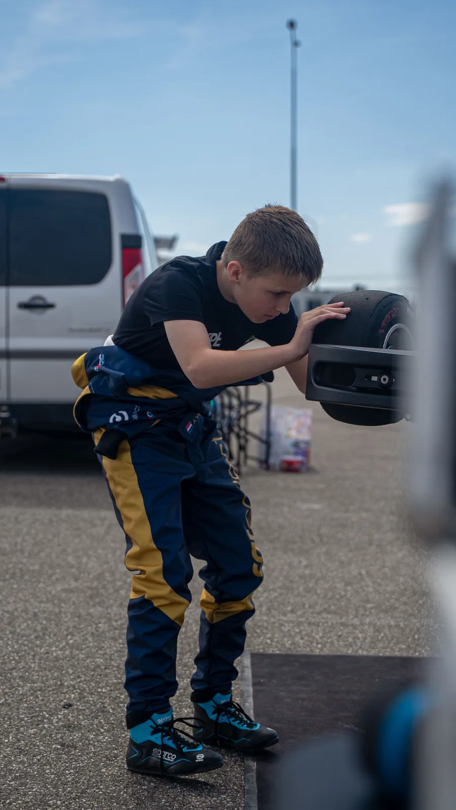 Jay Vermeulen checking the kart in the paddock